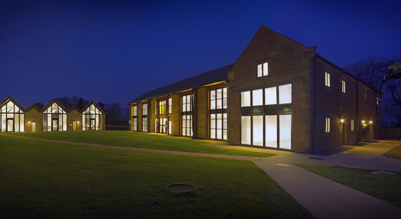 Prestwick Park buildings at night with lights on